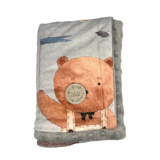 Doudou ourson dans l'espace